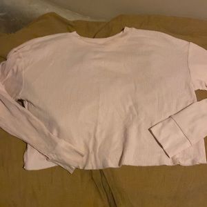 Cropped pink long sleeved tee. Good condition. Ribbed-like material.